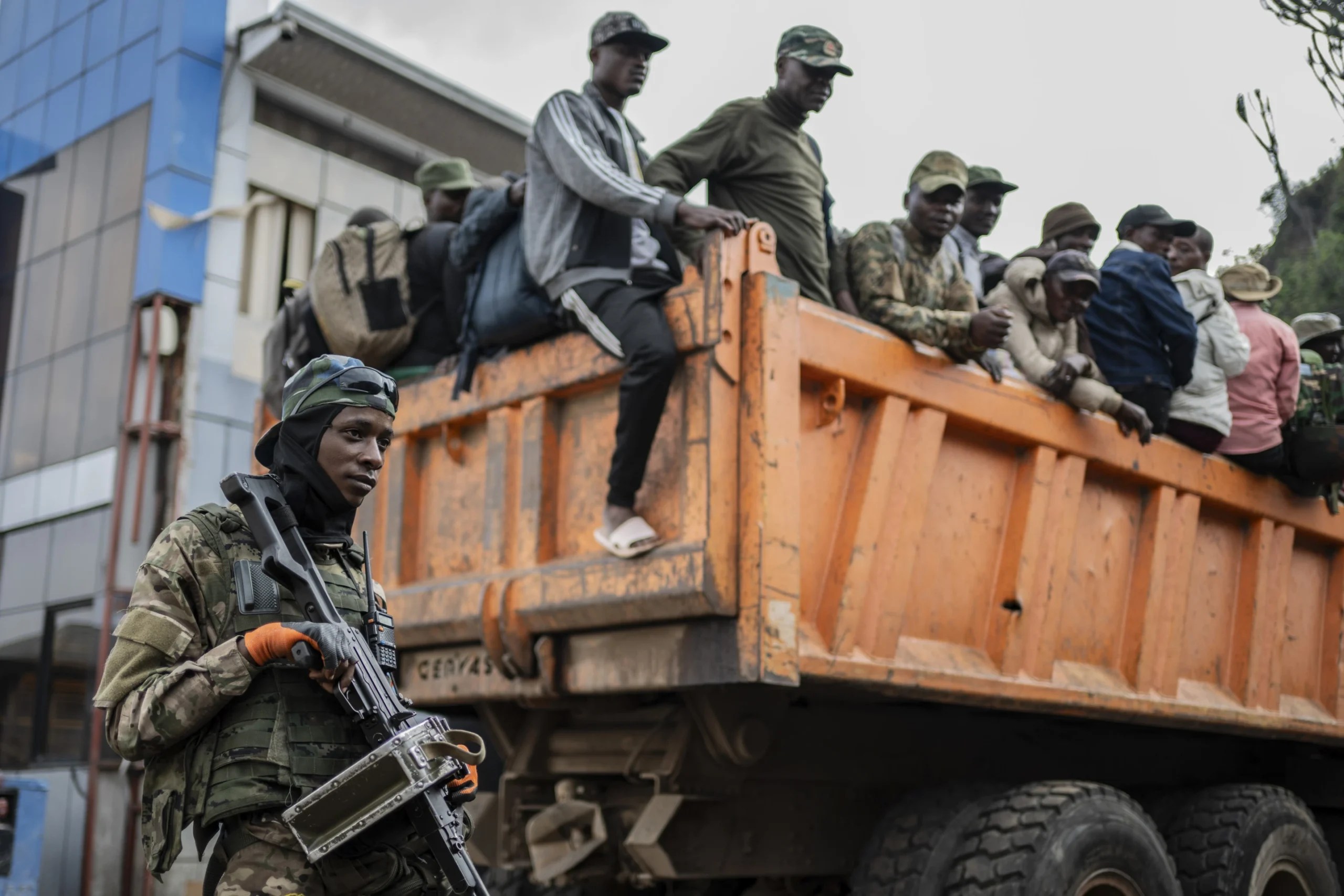 Former members of the FARDC and police officers who allegedly surrendered to M23 rebels arrive in Goma, DRC, on Feb. 23, 2025. (Credit: Moses Sawasawa/AP.)