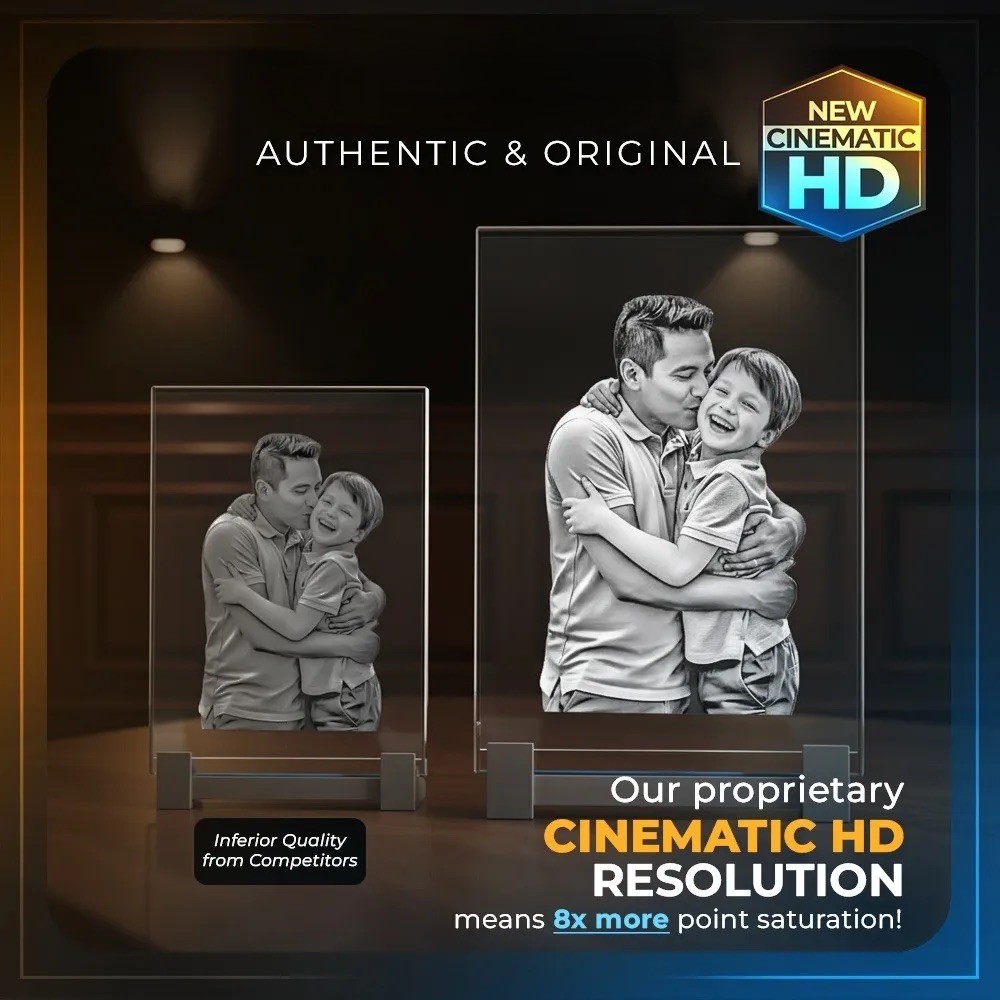 Two glass plaques display a grayscale engraved image of a man hugging a smiling child. The background is dark with spotlights. Text highlights CINEMATIC HD RESOLUTION and 3dphotos, comparing to Inferior Quality from Competitors.