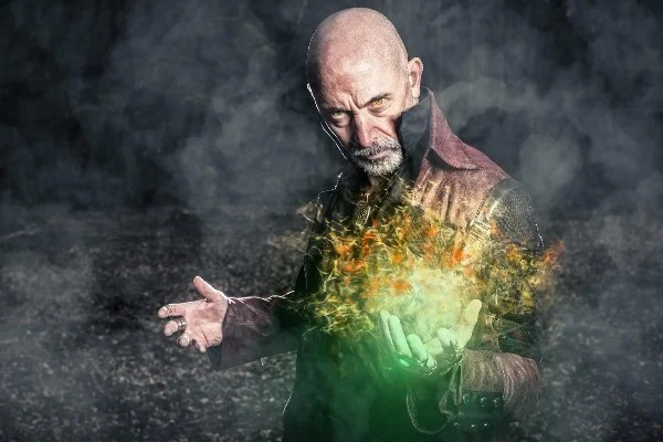 A sinister wizard preparing to cast a glowing green spell