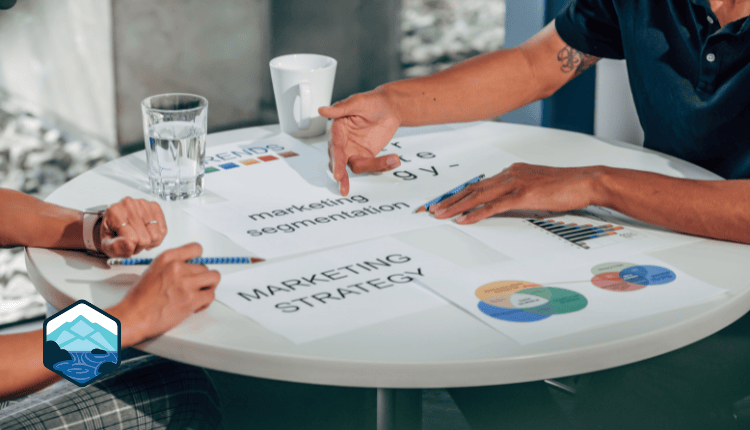 People meeting with charts in front of them
