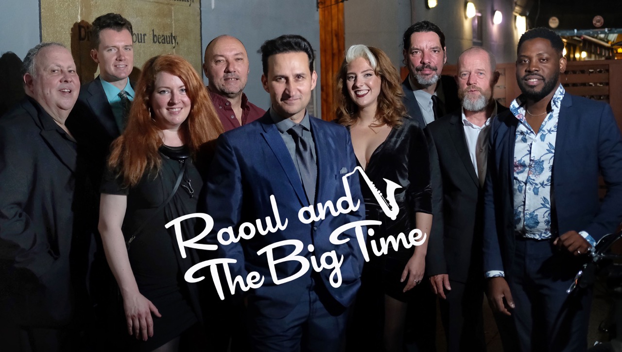 Raoul And The Big Time full band photo at The Rex Hotel Toronto — band logo and promotional image designed by Christine Doré Scaini, photography by Stephen Uhraney
The full complement of Raoul And The Big Time (www.raoulandthebigtime.com) photographed in front of The Rex Hotel in Toronto, featuring the band logo designed by Christine Doré Scaini of Creative Social Dynamic Projects — an image the band continues to use to promote their shows across Canada. Photography by award-winning photographer Stephen Uhraney (www.stephenuhraney.com). Photo shoot directed and curated by Christine Doré Scaini.