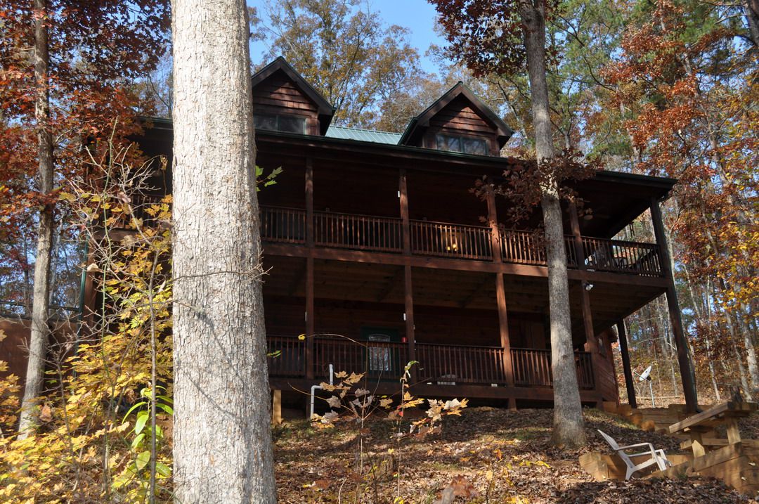 You can ride a zip line over to the pirate's treehouse! 100 Acre Wood Rental Cabin | Cuddle Up Cabin Rentals