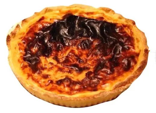 Le papet du Jura, tarte à la crème à la fleur d'oranger et au kirsch sur pâte briochée