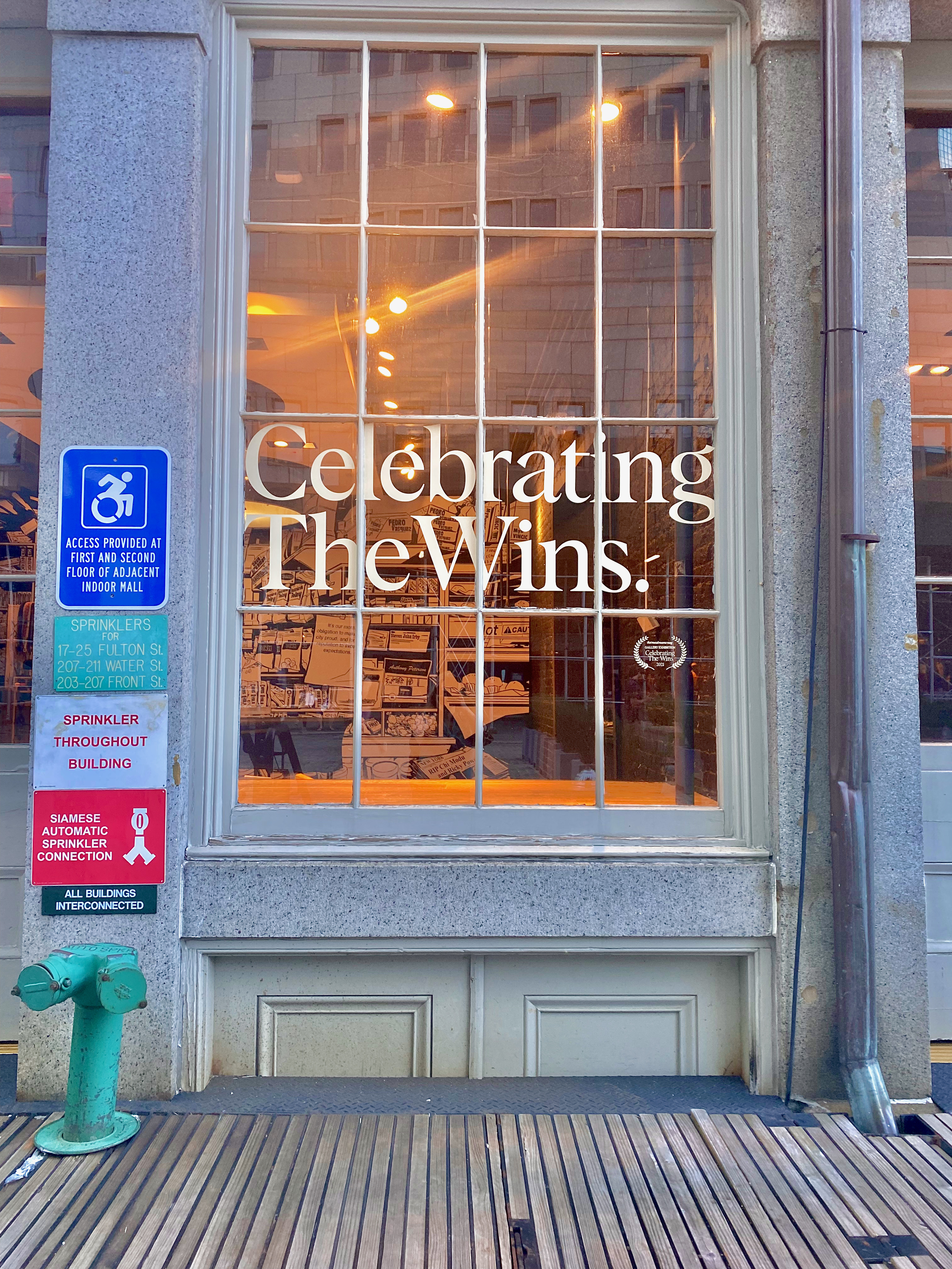 Celebrating the Wins sign in NYC