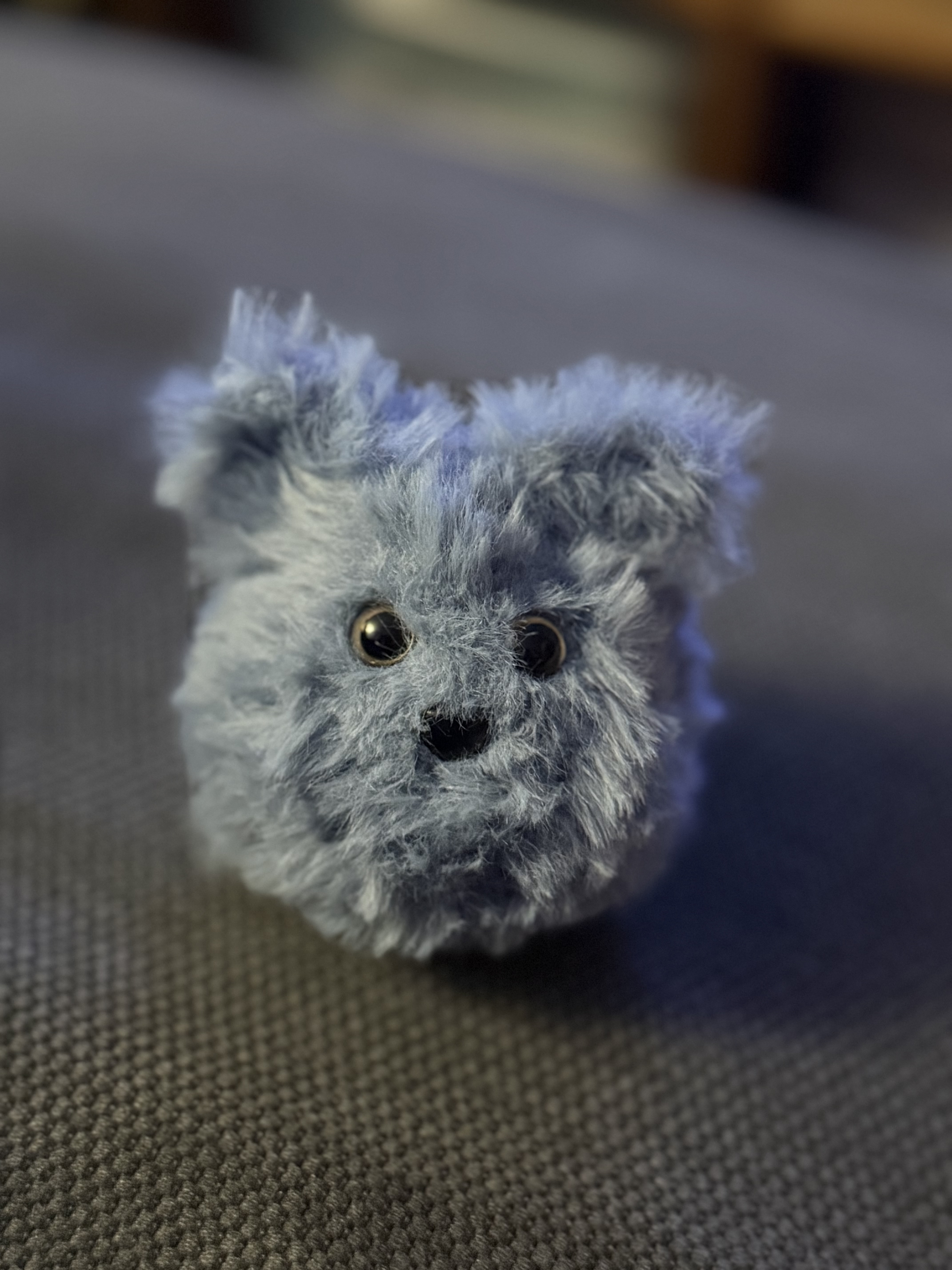 Peluche petit animal gris