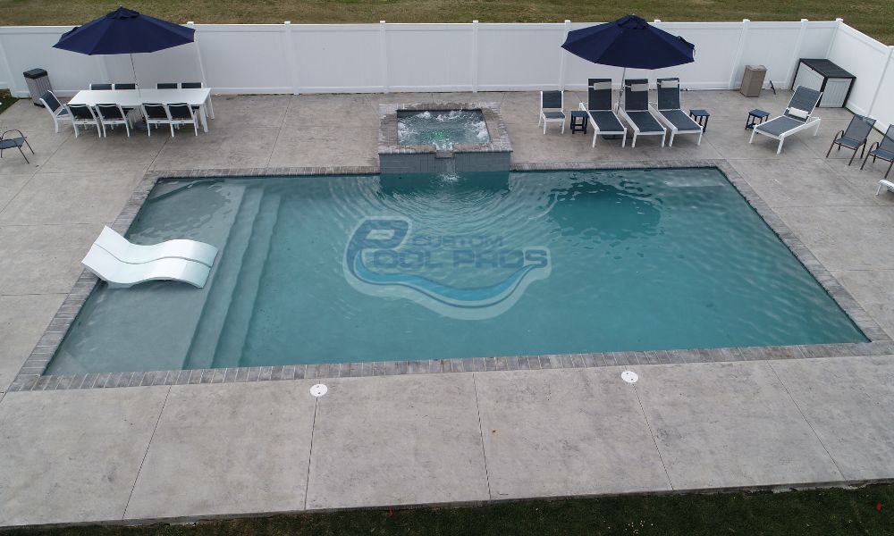 Relax and unwind by your low-maintenance pool