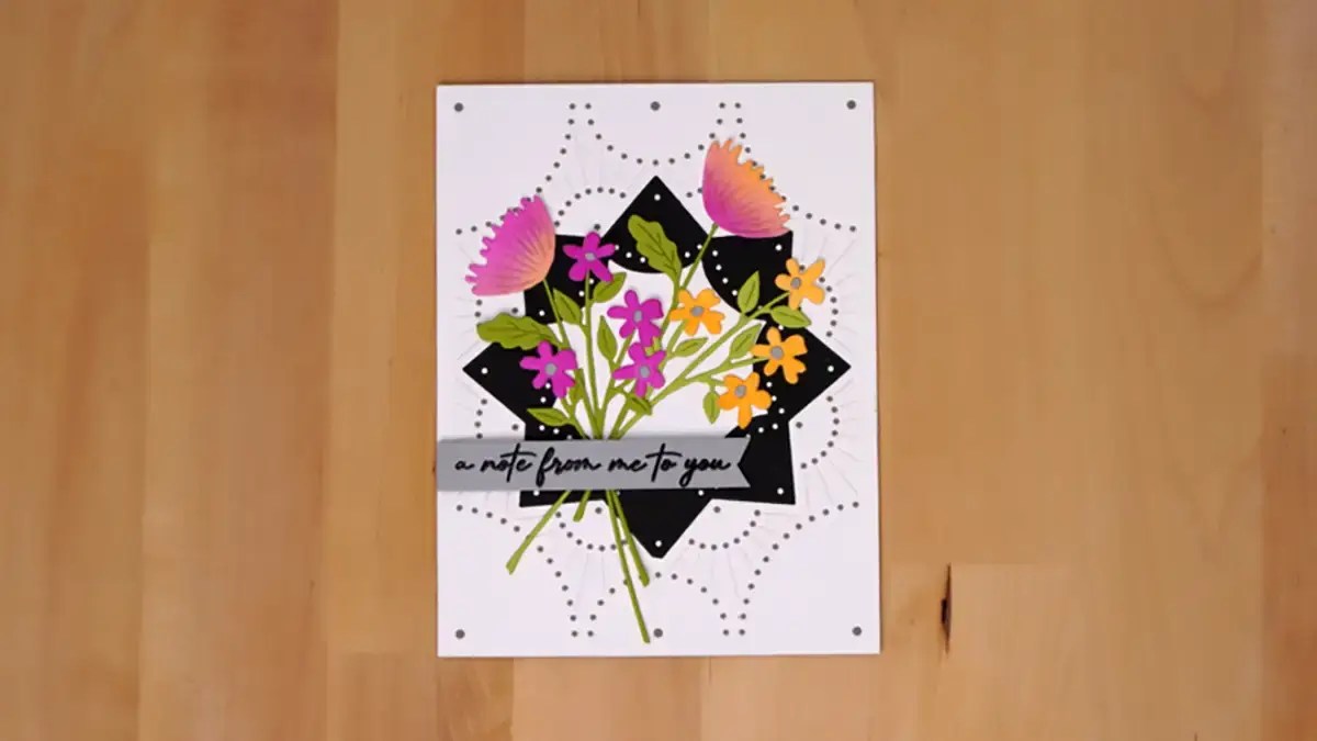 Pretty floral card using stitched cover die set for the background.