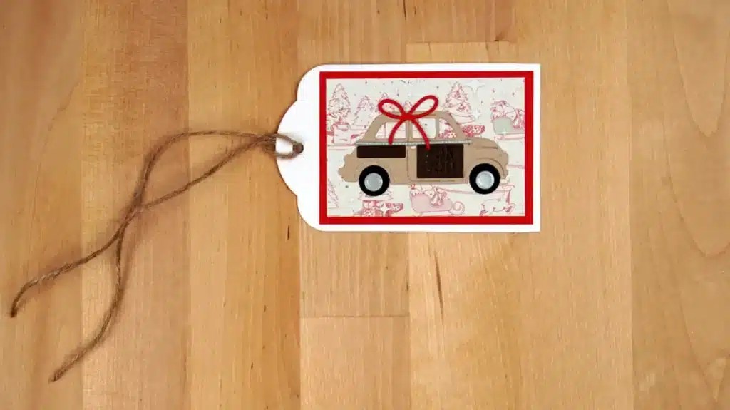 A gift tag with a car on it.