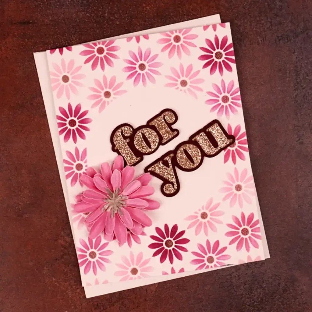 A pink and white card with the words for you on it.