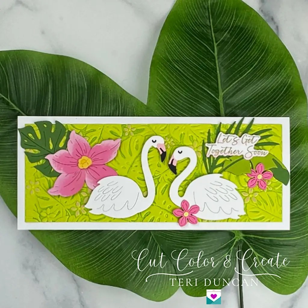 Two beautiful flamingos in a tropical paradise is the scene on this slimline card.