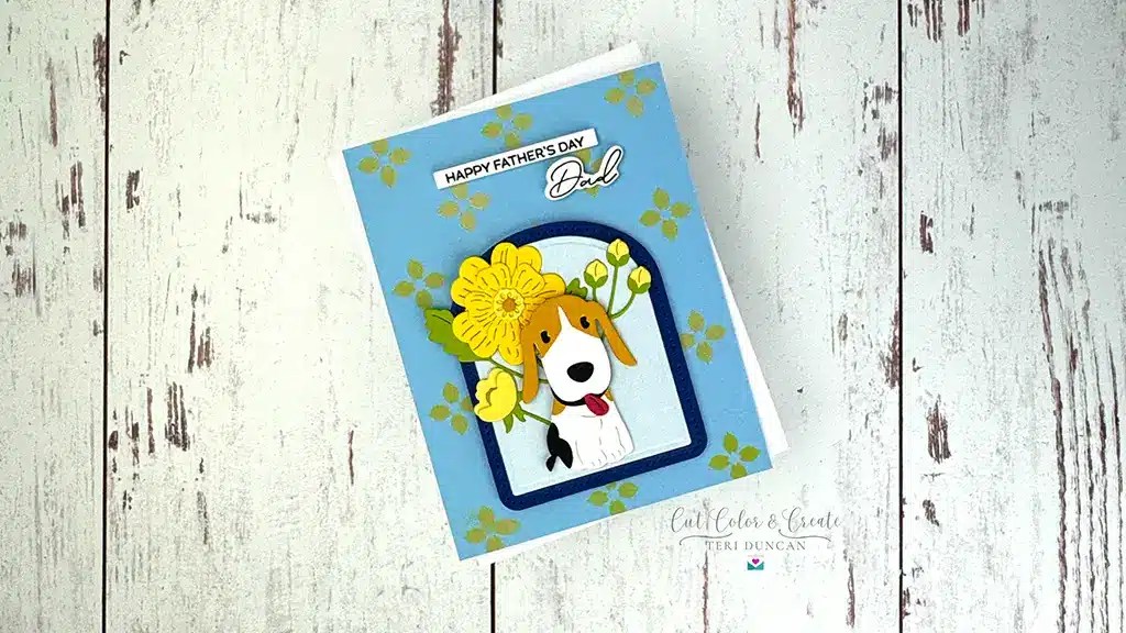 Celebrate Father's Day with this charming Spellbinders card featuring a beagle illustration surrounded by yellow flowers on a blue background. Perfect for the dog-loving dad, this design is part of our exclusive March '25 Kits collection.