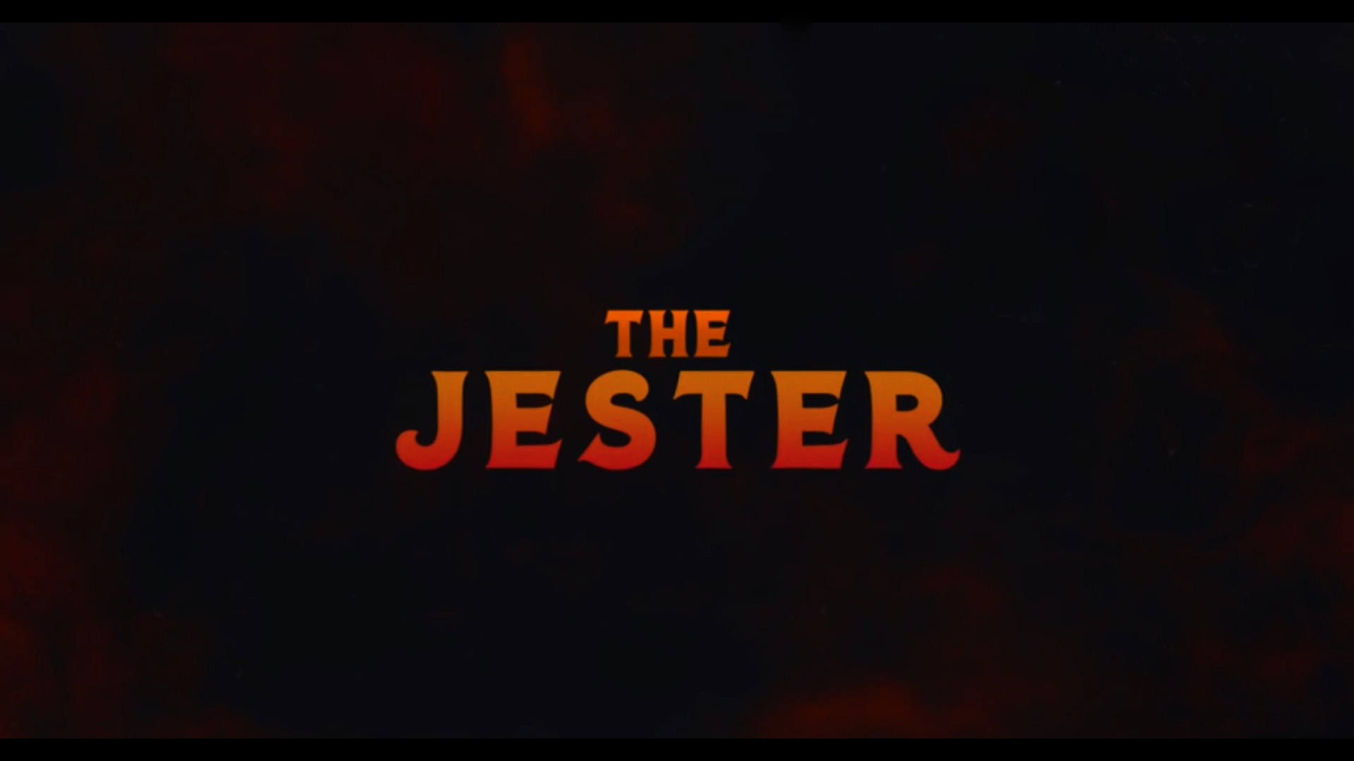 Written in orange is "The Jester", over a black background with a red mist.