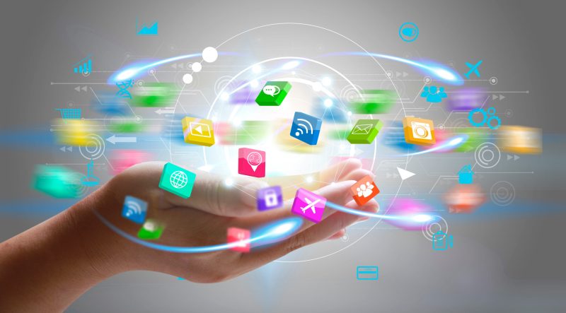 Application icons interface on hand. Social media concept – Cyber Tips Guide