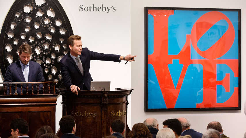What influence do art auctions have on the art scene?