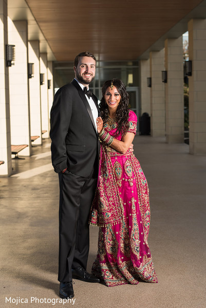 Gorgeous Indian Bride And Groom Posing With Their Wedding Reception Outfits Photo 183411