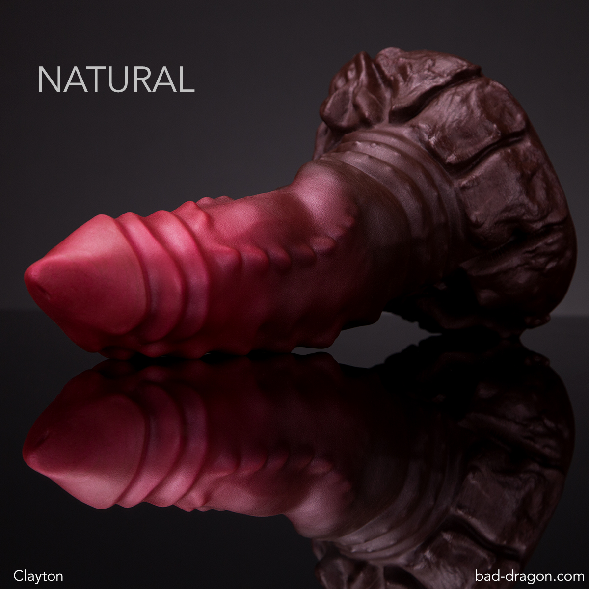 A dark pearly red to a dark reddish brown fade