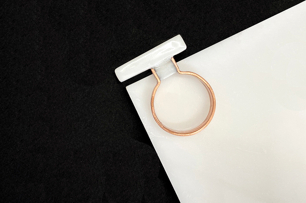 Marble on copper ring