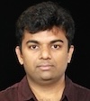 Formal portrait photo with studio lighting on dark background