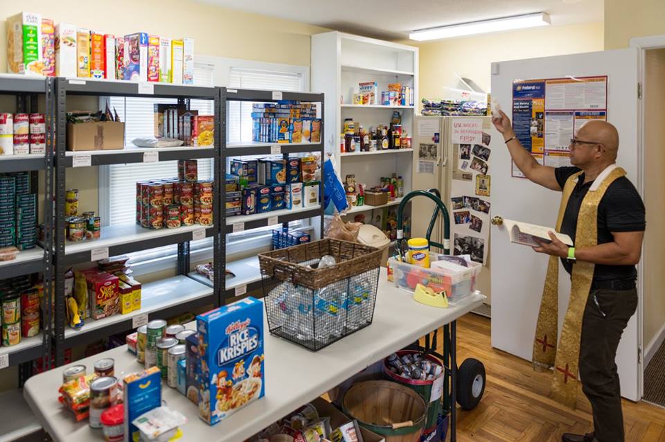 Father Cromwell of St. Joseph Catholic Church blessed the renovated pantry.