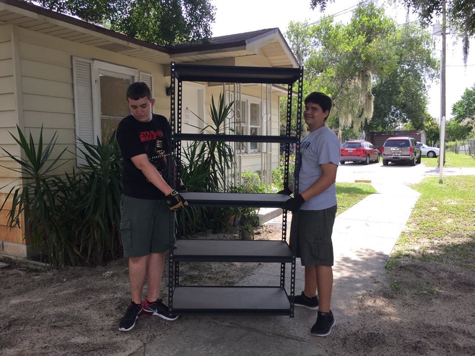 Scout volunteers installed new pantry shelves