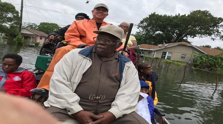 Scott Snivley giving locals a ride to higher ground