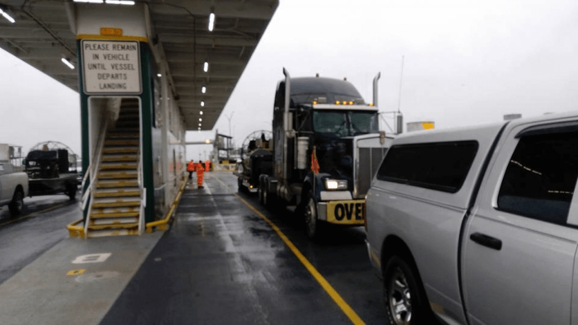 Trucks, Semi, and Airboats on Ferry