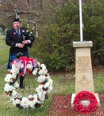 Doc playing bagpipes for Remembrance Day ceremony.