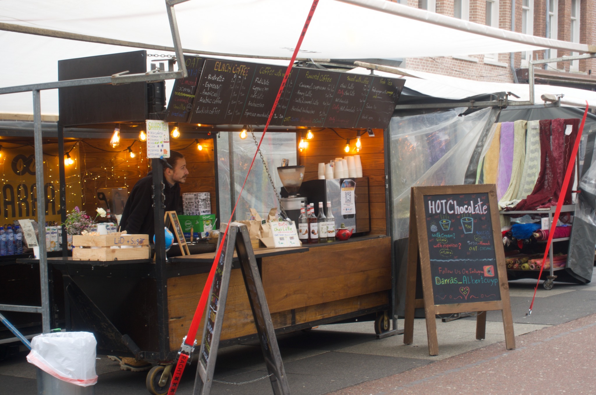 A cup of latte from a small coffee stand at Albert Cuyp Market in Amsterdam.