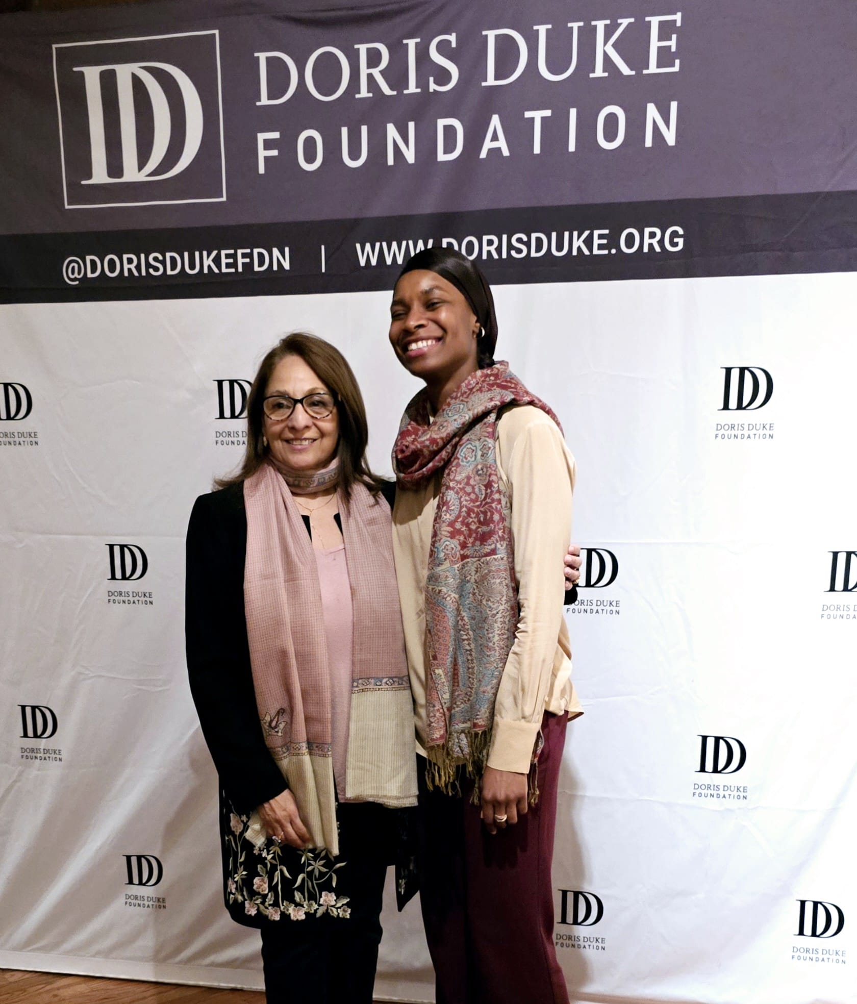 Daisy Khan engaging with civic leaders and community members, encouraging dialogue, inclusion, and collaborative social action.