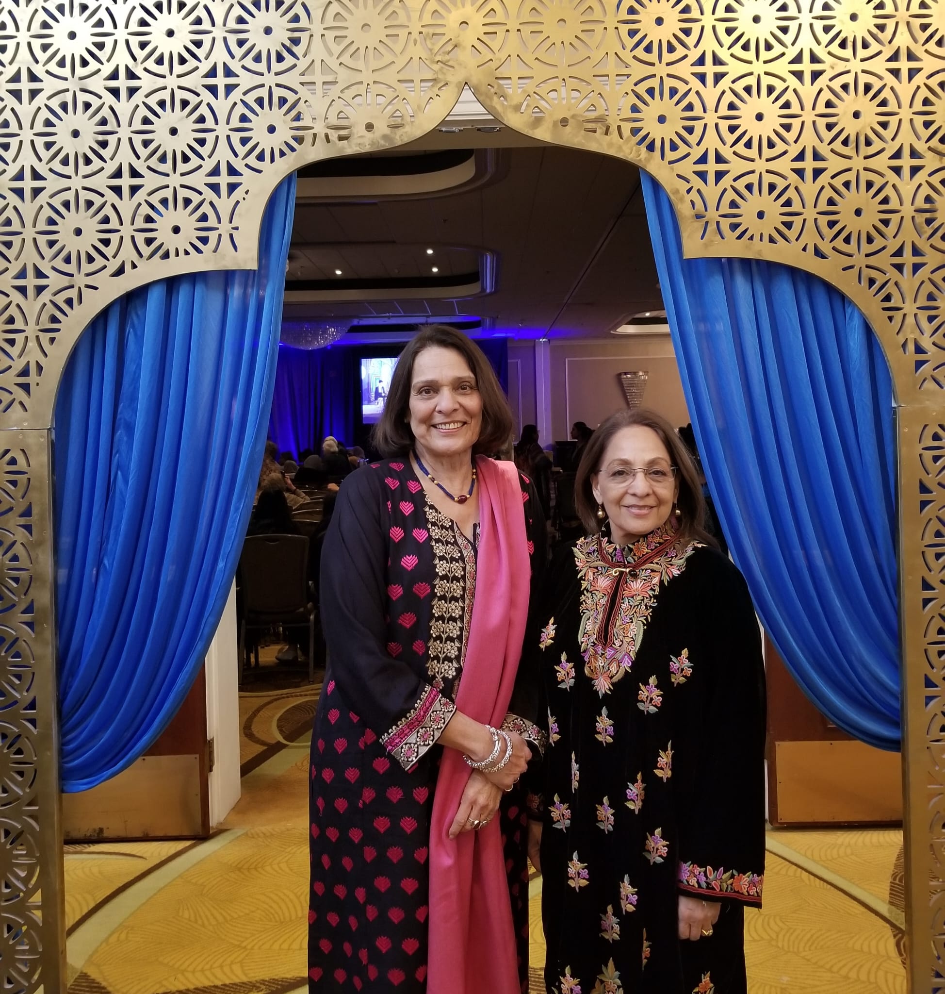 Daisy Khan speaking at a community organization event, encouraging civic participation, interfaith cooperation, and social unity.