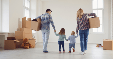 Professional cleaners performing move-in and move-out cleaning service in an empty apartment.