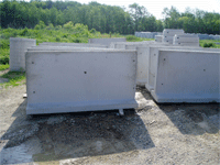Yard full of concrete tanks