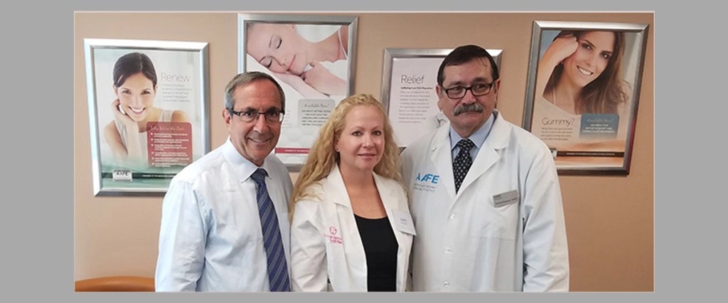 Dr. Hilary Dalton posing with her associates. They provide dental services in Tampa Fl.