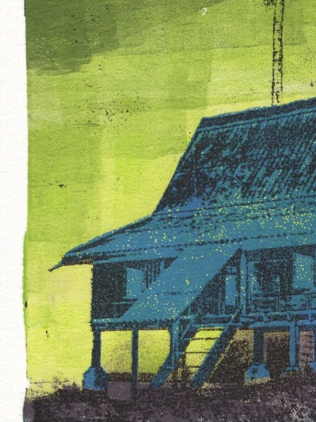 House in Blue shown in a detailed shot. This is a gel plate monotype by Daniel Arendzen: the close-up shows the blue roof and front staircase of the traditional Malaysian house, speckled with tiny light spots where the paint beaded up, against a lime green sky with small black dots