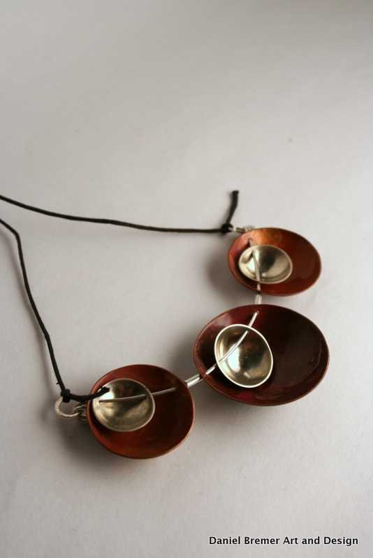 Triplet pendant; copper, sterling silver