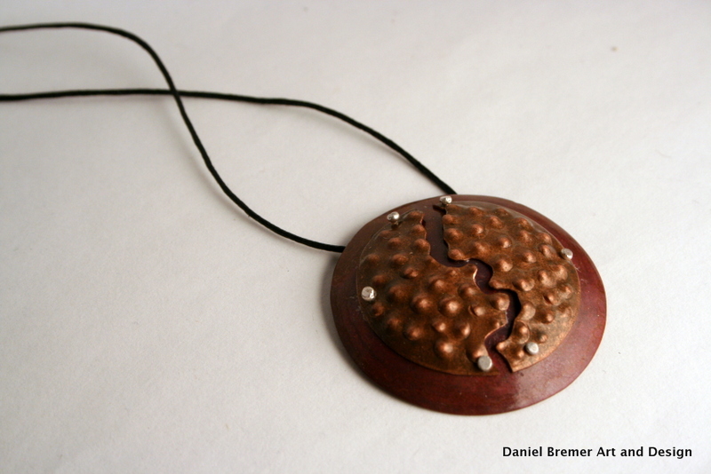 Cracked pendant; copper, sterling silver