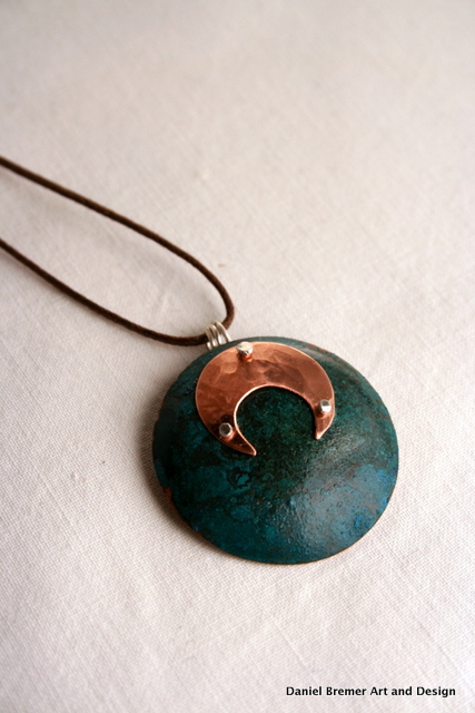 Eclipse pendant; copper, sterling silver