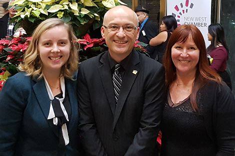 Angela Falbo (l) and Lizz Kelly (r) join Daniel for the inaugural New Westminster Chamber of Commerce Christmas Open House at City Hall