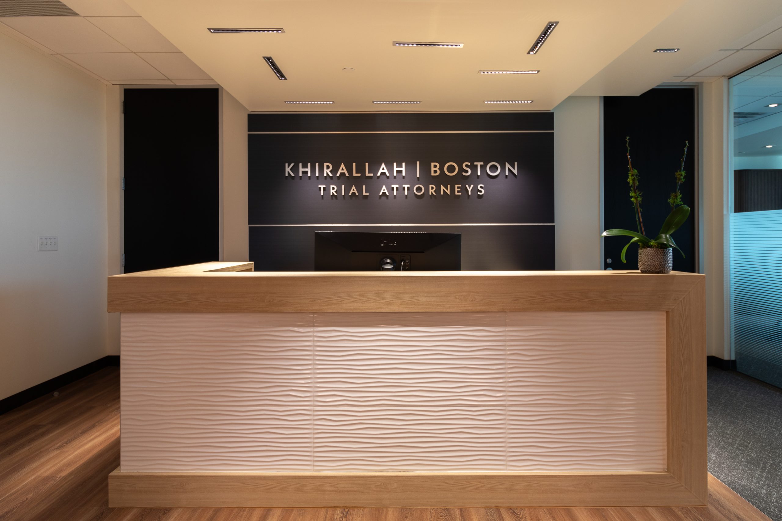 Reception desk at Khirallah Boston trial attorneys office.
