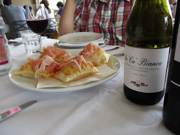 Pillows of bread with prosciutto on top