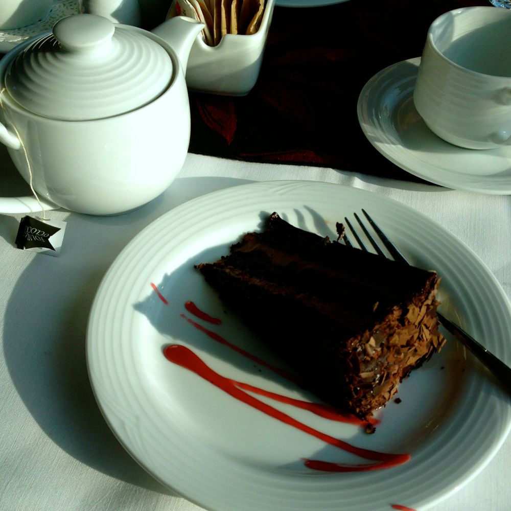 Delicious chocolate cake with green tea