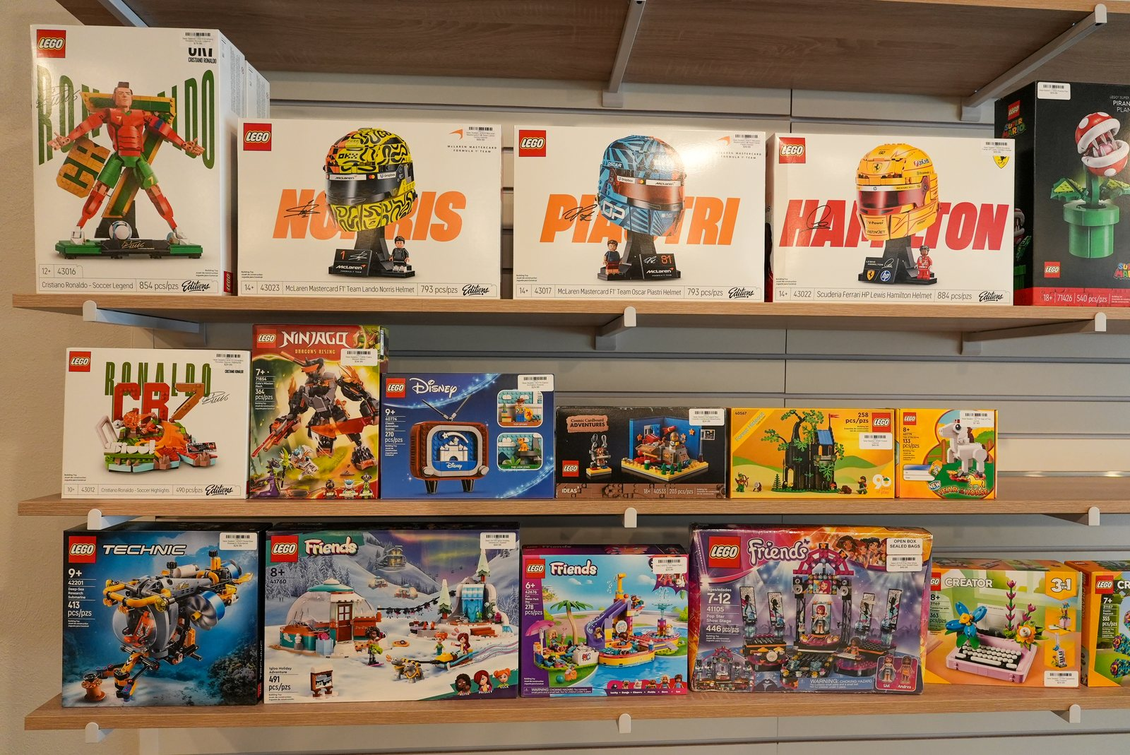 Boxed LEGO sets on the Dapper Bricks shelves