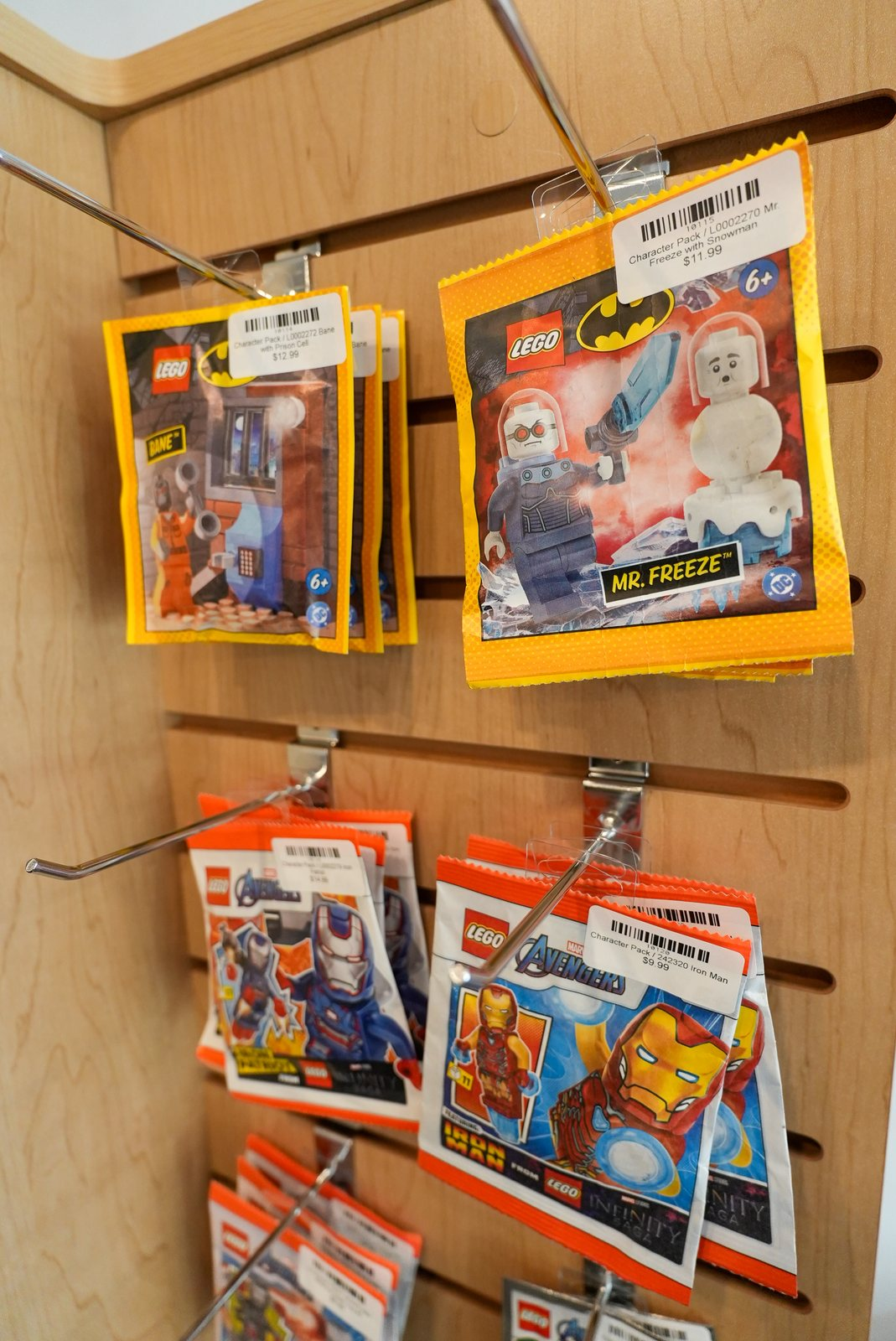 LEGO polybag sets hanging on a store display