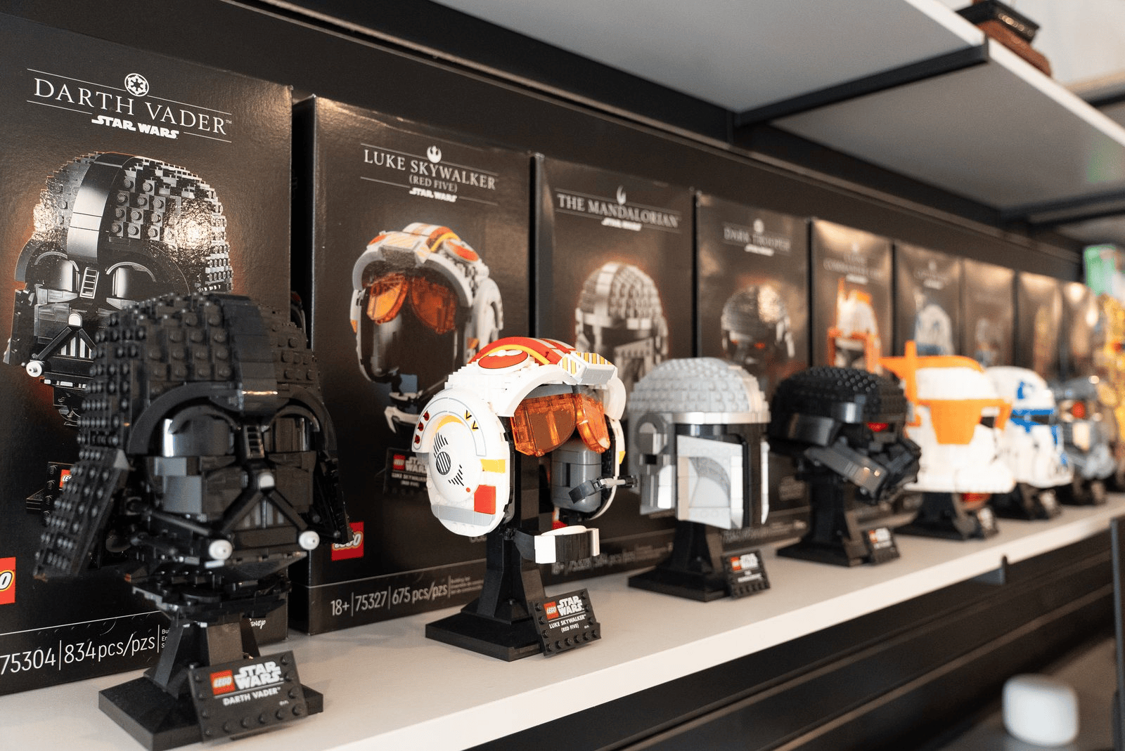 LEGO Star Wars helmet builds on a shelf