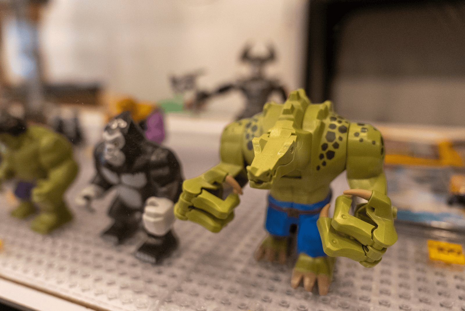 LEGO superhero minifigures in the display case