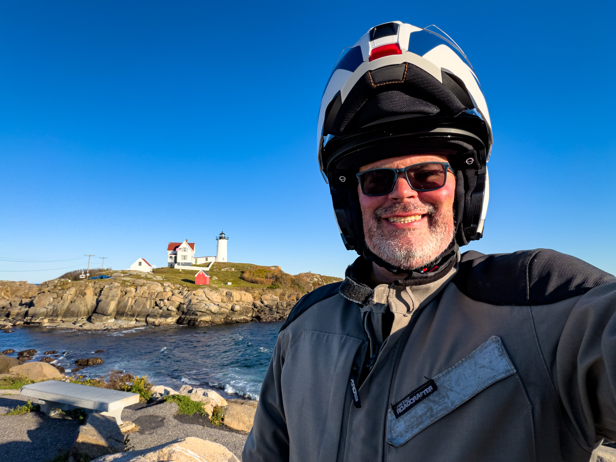 Helmeted selfie with Nubble Lighthouse in the background