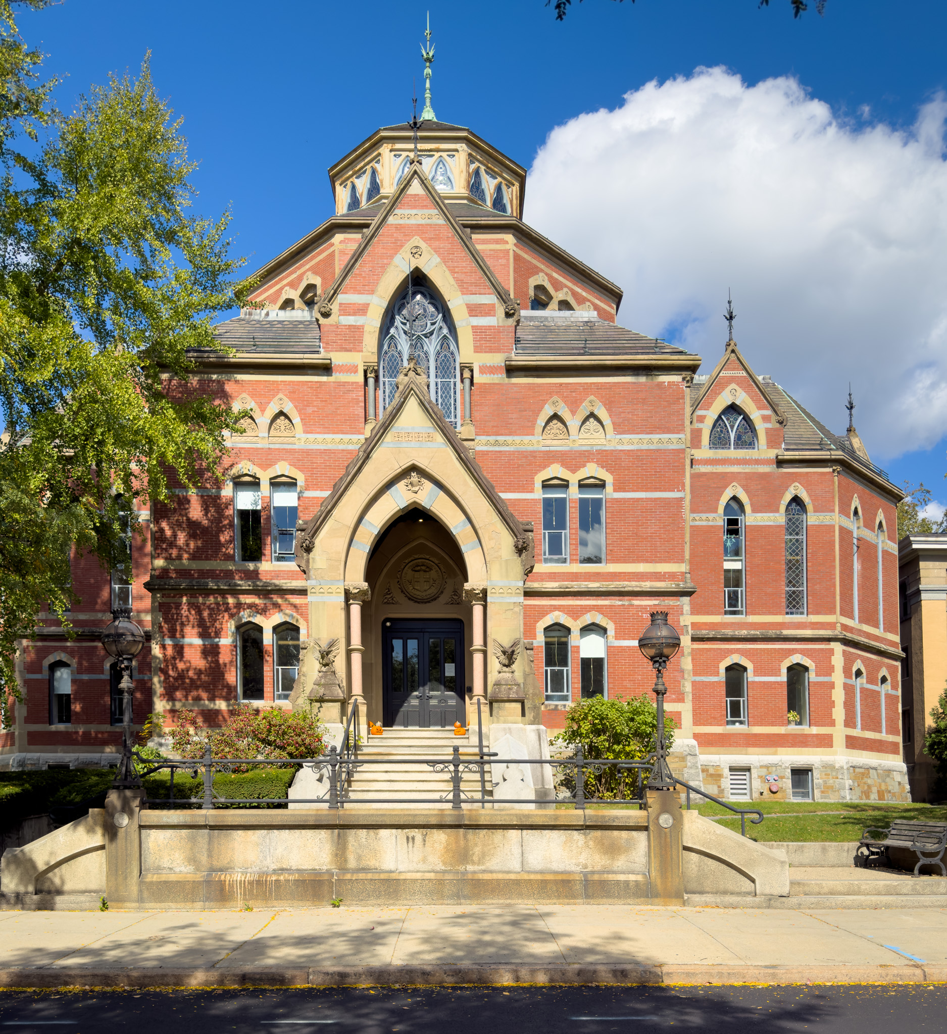 Victorian brick building with a carved stone entrance