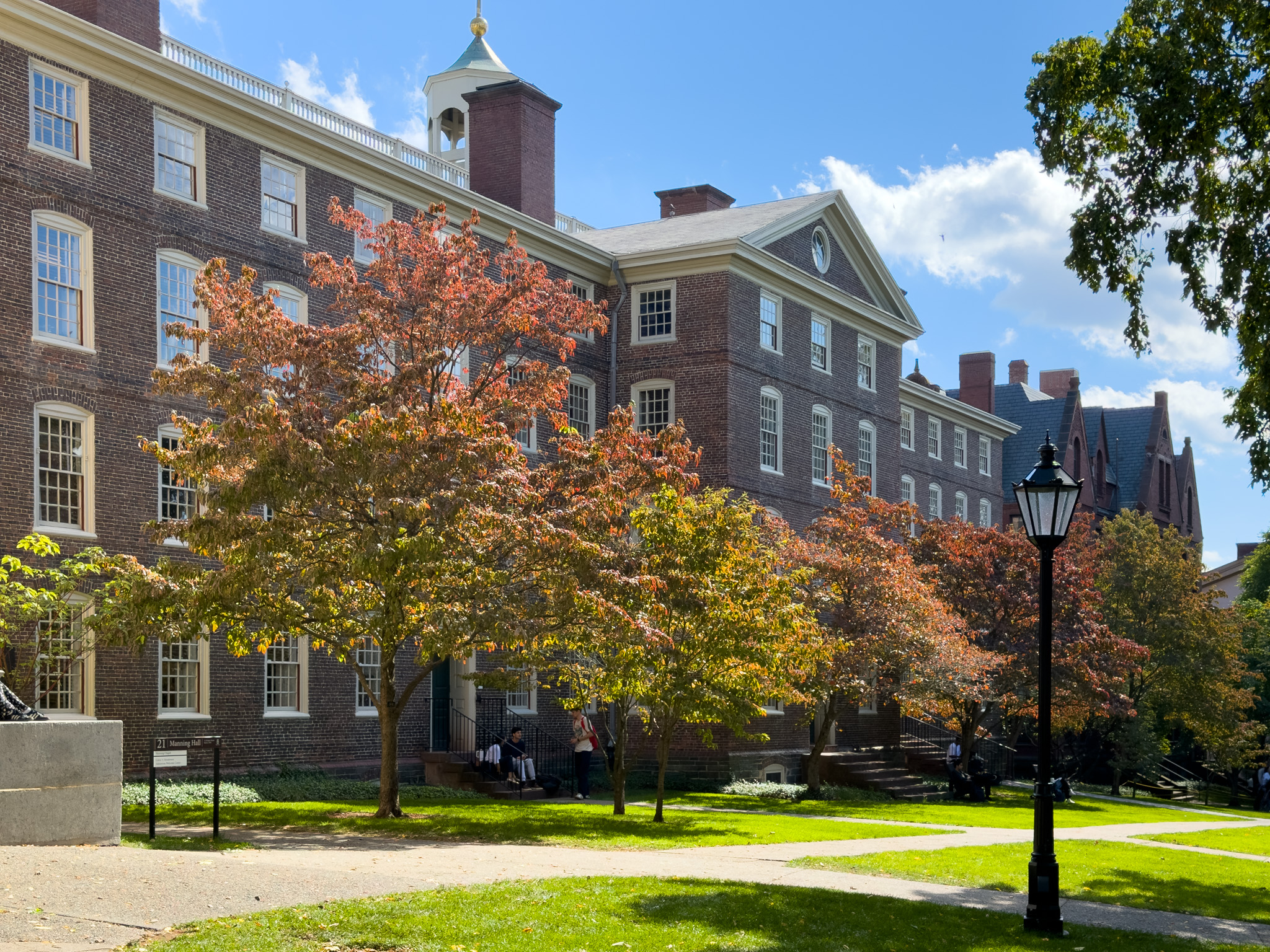 Brick dormitories and fall trees on the Brown green