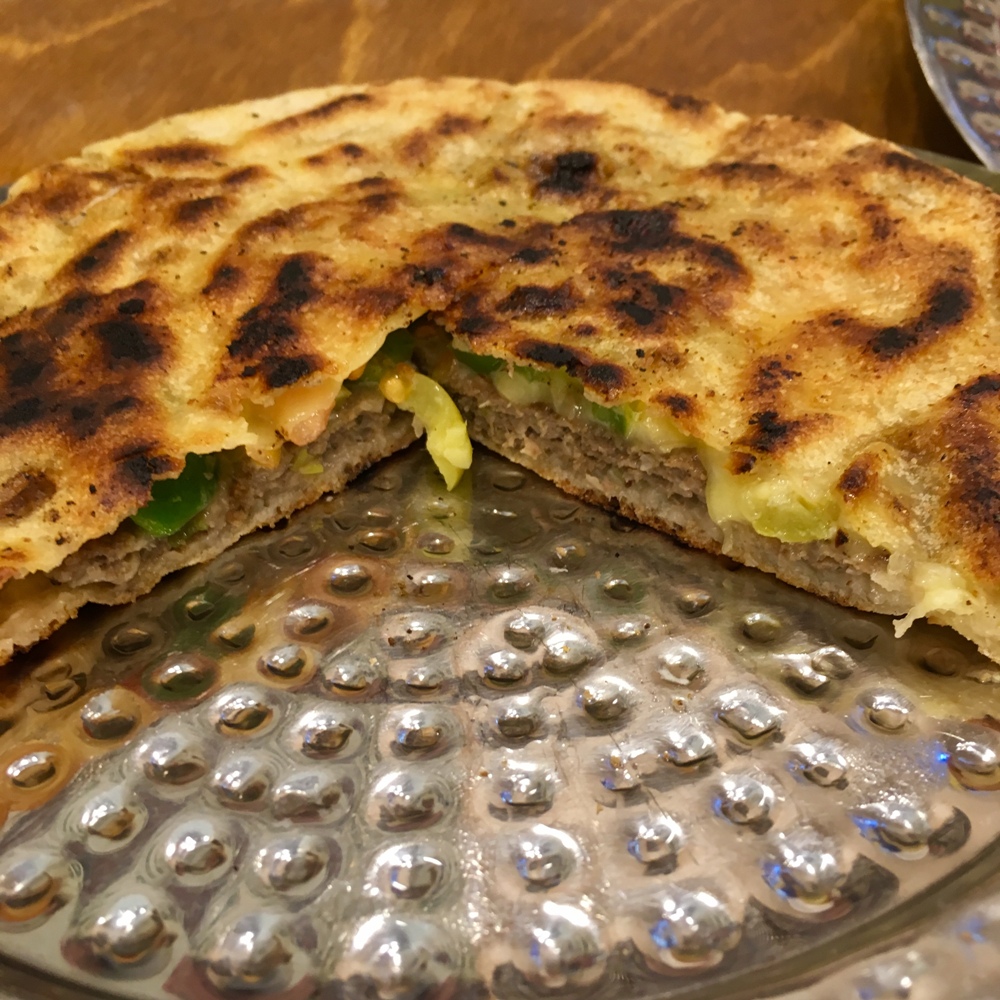 Hawwawshi (Egyptian Hamburger). During our food tour in Cairo