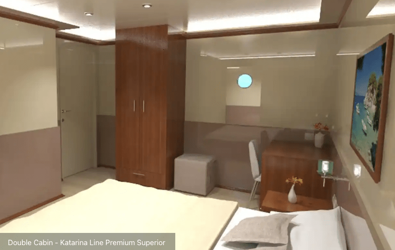 Compact ship cabin with wardrobe and desk